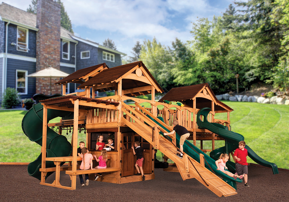 Treehouse Combo with two roofed cabins, lower playhouse, wave slide and spiral tube slide