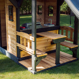 Canyon Creek lower playhouse with toy barbecue, sink and built-in cedar picnic table